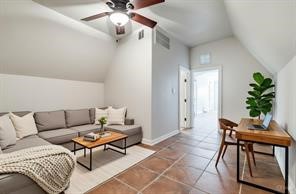 1318 Peden Street, Unit D Houston, TX 77006 - Photo 26 of 33 a living room with furniture and a potted plant