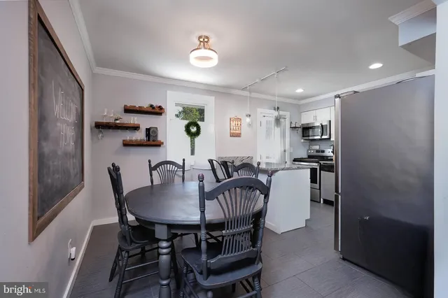 a view of a dining room with furniture