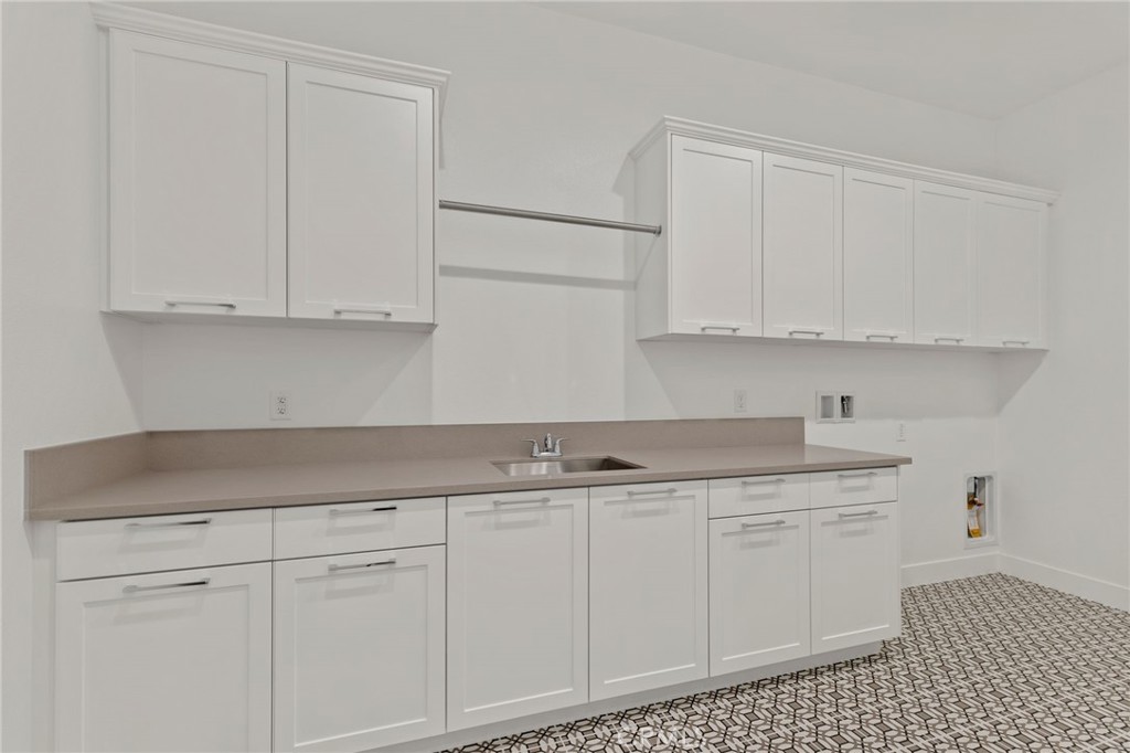 11864 Red Hawk Lane Porter Ranch, CA 91326 - Photo 16 of 21 Laundry Room: Alta Loma Italianate - Ridge Collection at Bella Vista - Photo of another Alta Loma - Not actual home for sale - Home is still under construction
