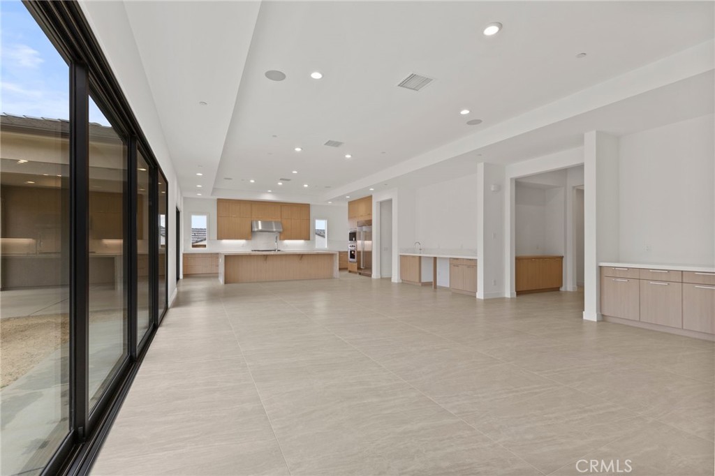 11864 Red Hawk Lane Porter Ranch, CA 91326 - Photo 3 of 19 Great Room: Alta Loma Italianate - Ridge Collection at Bella Vista - Photo of another Alta Loma - Not actual home for sale - Home is still under construction