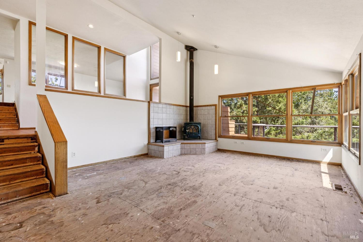 21540 Siri Road Guerneville, CA 95446 - Photo 11 of 99 a view of an empty room with a window