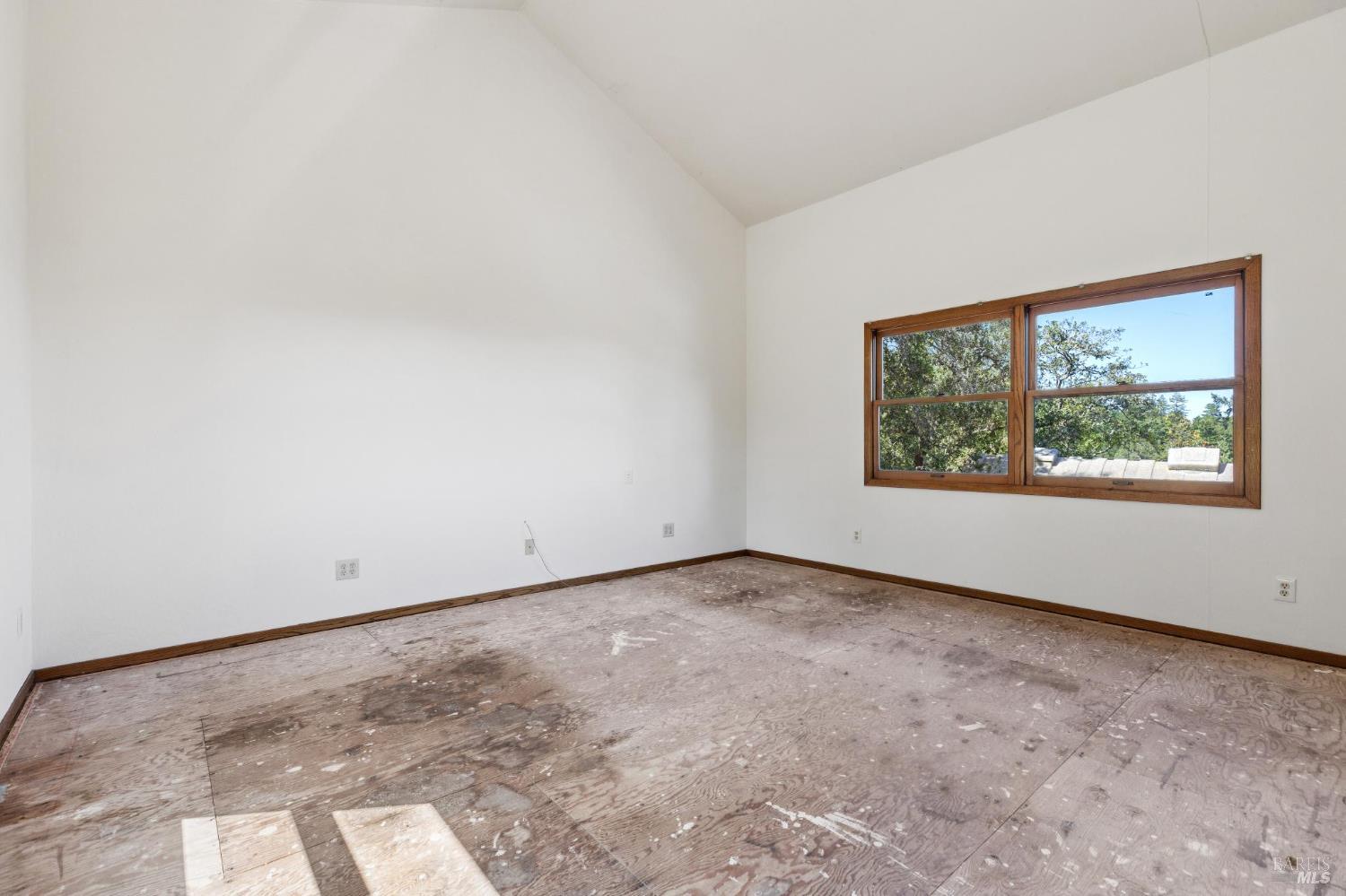 21540 Siri Road Guerneville, CA 95446 - Photo 40 of 99 an empty room with a window