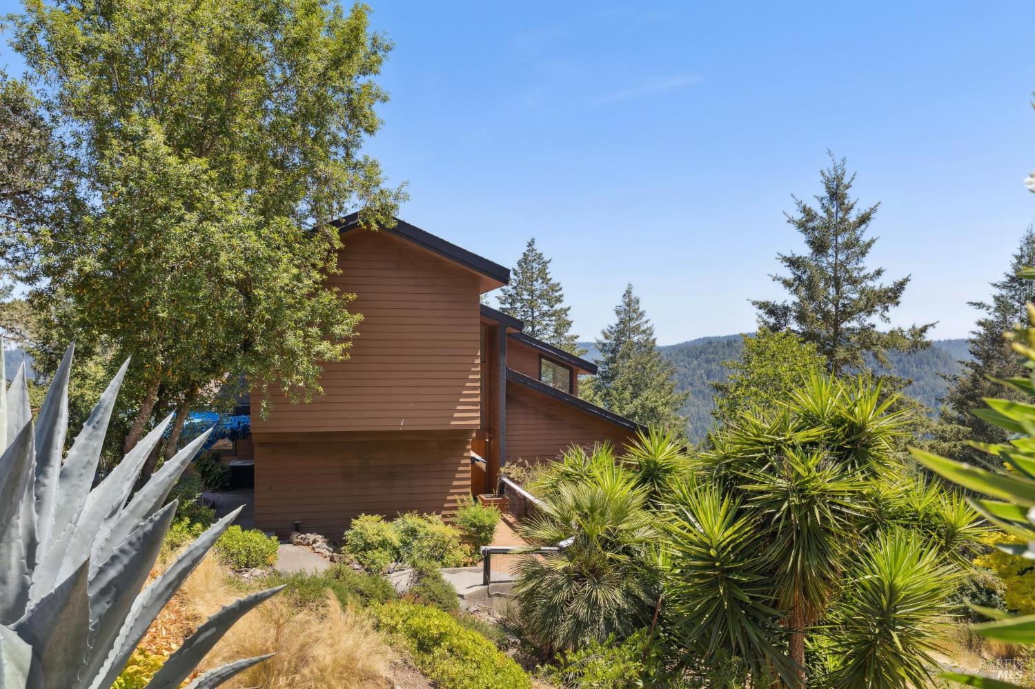 21540 Siri Road Guerneville, CA 95446 - Photo 4 of 99 a backyard of a house with lots of green space