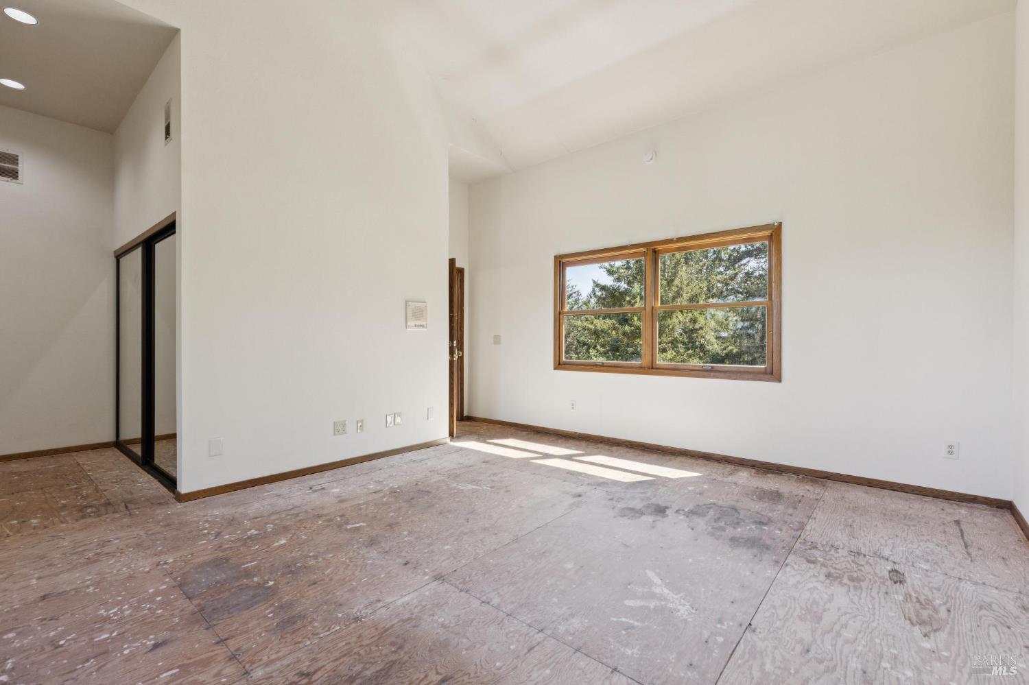 21540 Siri Road Guerneville, CA 95446 - Photo 42 of 99 a view of an empty room with a window