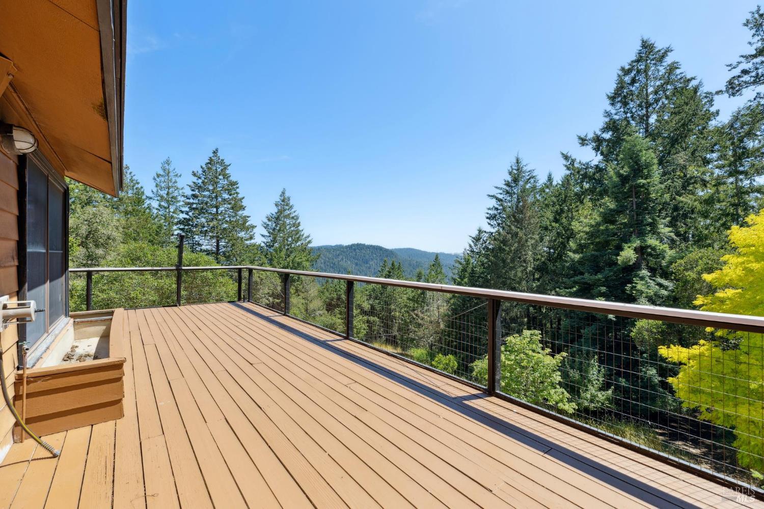 21540 Siri Road Guerneville, CA 95446 - Photo 57 of 99 a view of balcony with wooden floor and fence