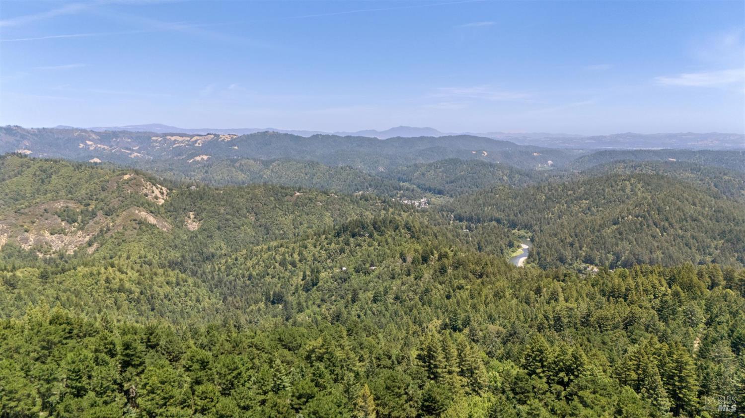 21540 Siri Road Guerneville, CA 95446 - Photo 73 of 99 a view of a city with mountains in the background