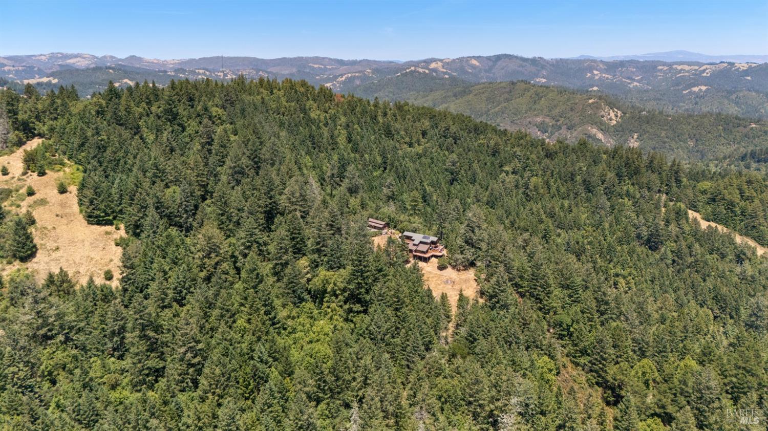 21540 Siri Road Guerneville, CA 95446 - Photo 79 of 99 a view of a town with mountains in the background