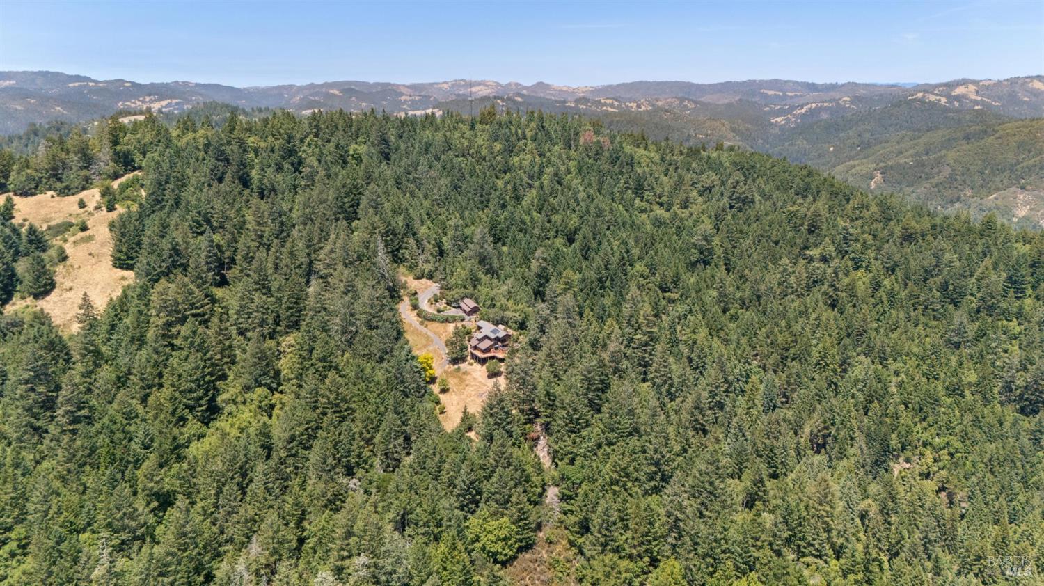 21540 Siri Road Guerneville, CA 95446 - Photo 80 of 99 a view of a lush green hillside and a mountain