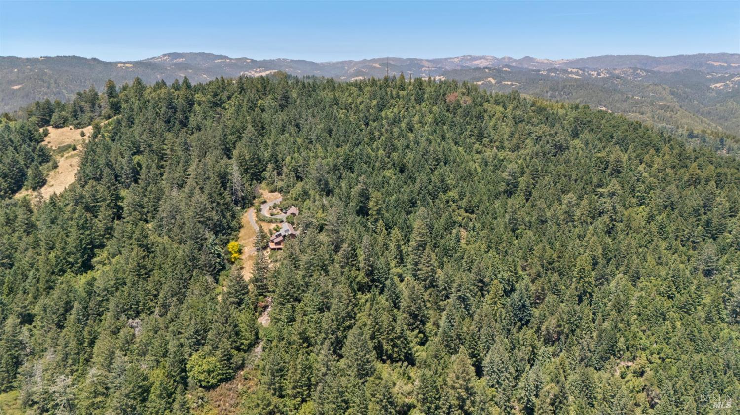 21540 Siri Road Guerneville, CA 95446 - Photo 81 of 99 a view of a town with mountains in the background