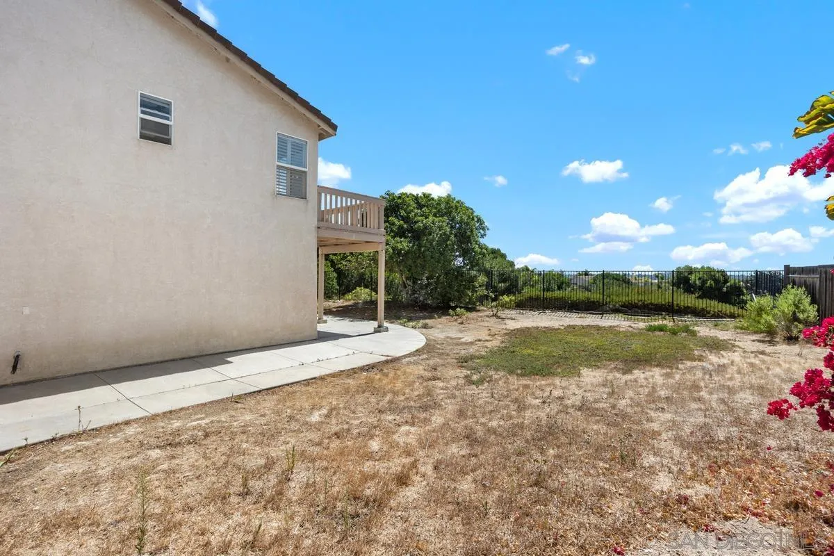 408 Shadow Tree Drive Oceanside, CA 92058 - Photo 26 of 29 a view of a backyard of a house