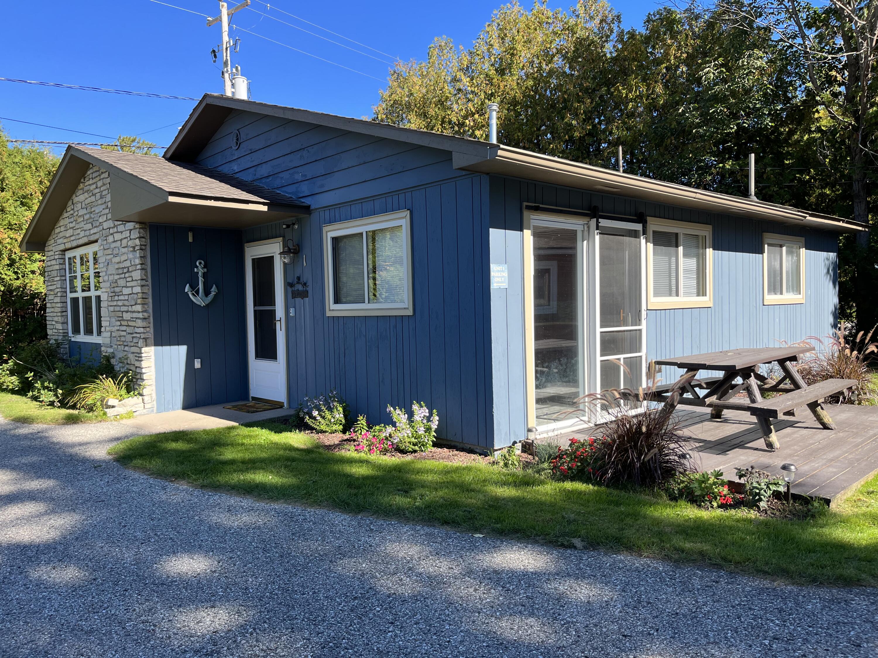 4488 Oden Road, Unit 1 Alanson, MI 49706 - Photo 2 of 20 Front