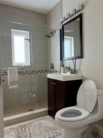 a view of swimming pool with outdoor seating and yard