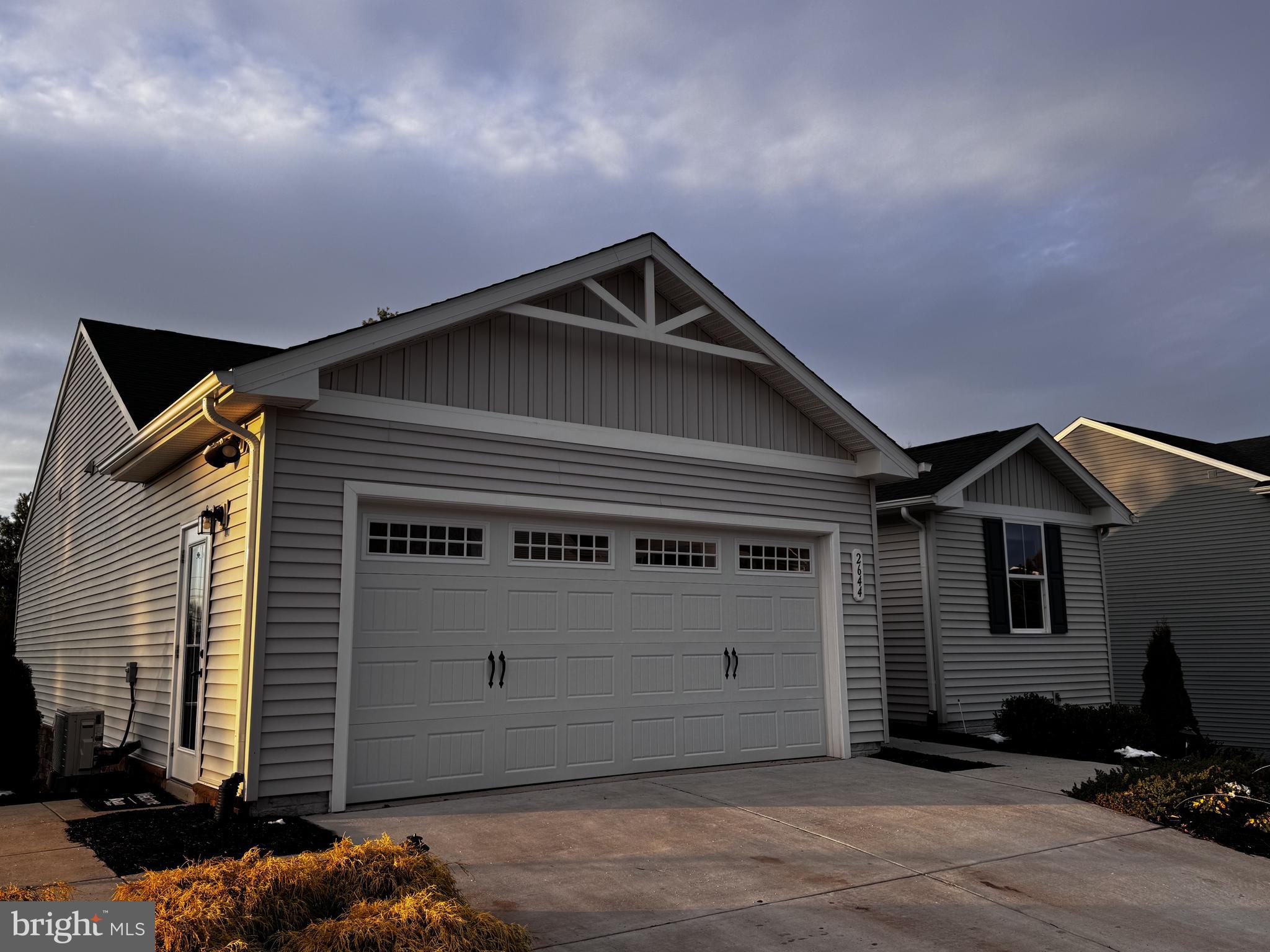 2644 High Point Drive Culpeper, VA 22701 - Photo 2 of 5 a front view of a house with a yard
