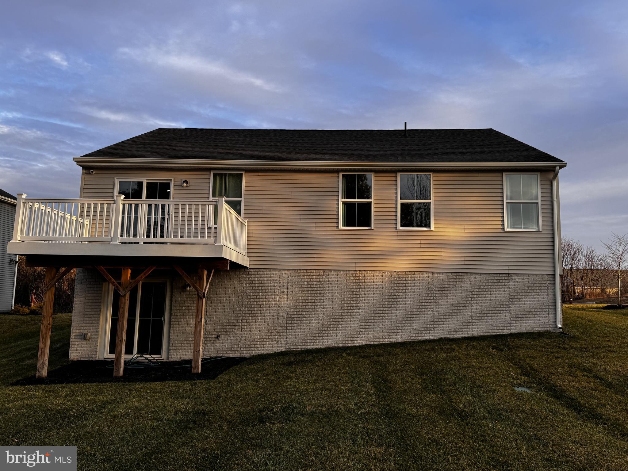 2644 High Point Drive Culpeper, VA 22701 - Photo 4 of 5 a front view of a house with garden