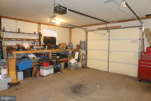 a bed room with furniture and a window