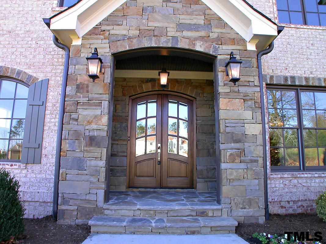 1005 Exeter Field Circle Raleigh, NC 27614 - Photo 3 of 25 a front view of a house