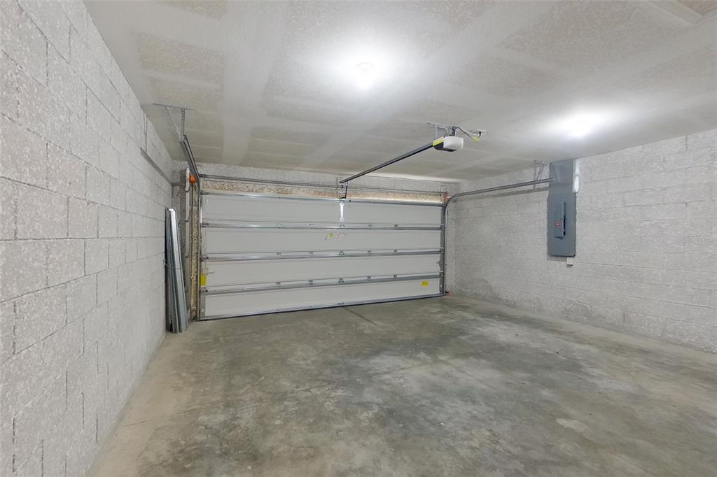 18318 Gibraltar Lane Lehigh Acres, FL 33936 - Photo 13 of 14 a view of room that has a white walls