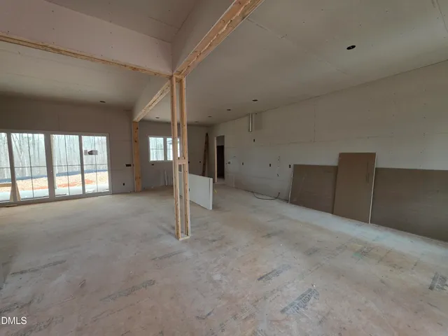 a view of a hallway with stairs