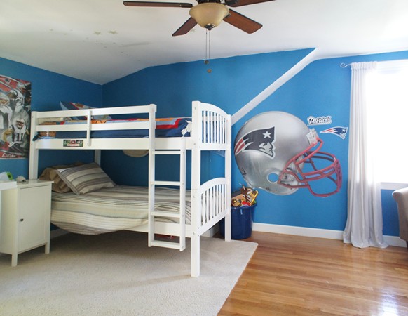 18 Vanness Road Weymouth, MA 02191 - Photo 10 of 19 a bedroom with a bed and a chandelier