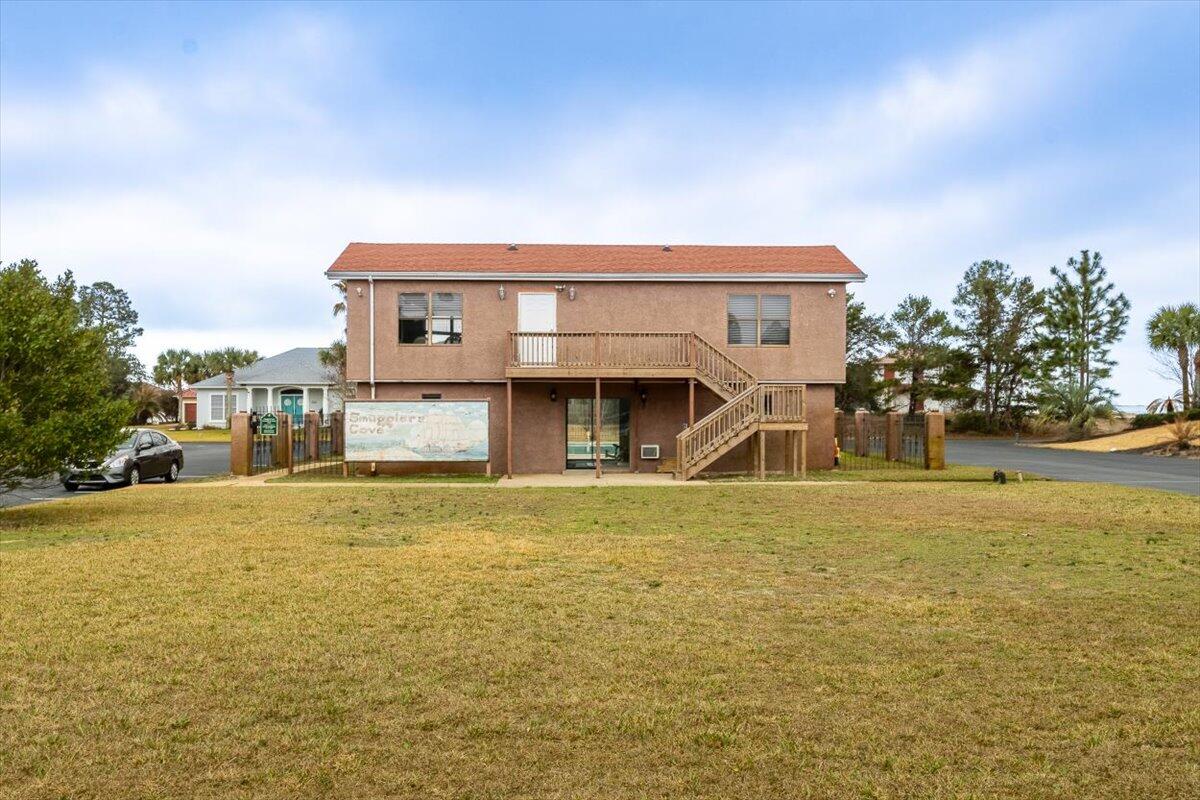 6308 Smugglers Way 2 Gulf Breeze, FL 32563 - Photo 11 of 17 a front view of house with ocean view