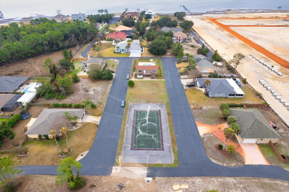 6308 Smugglers Way 2 Gulf Breeze, FL 32563 - Photo 8 of 17 a view of a swimming pool with sitting area