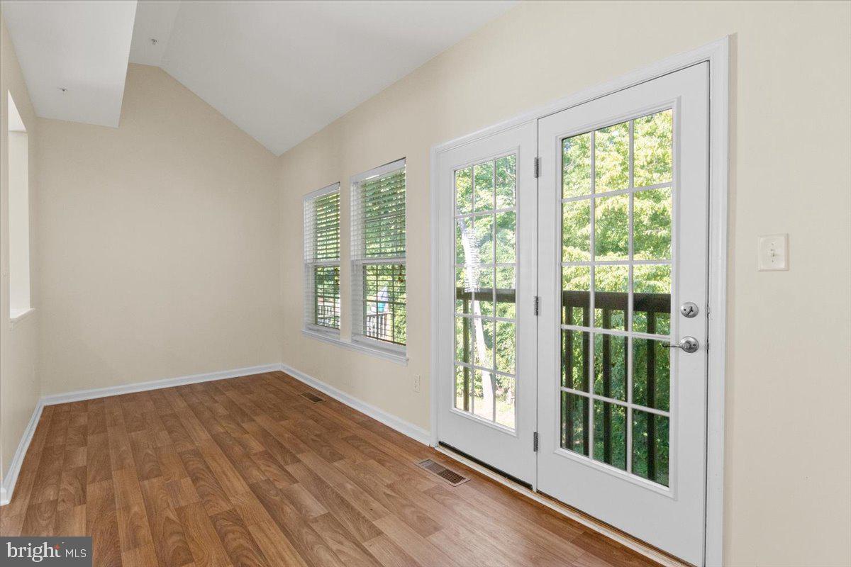 8329 Autumn Crest Lane, Unit 6 Chesapeake Beach, MD 20732 - Photo 13 of 30 a view of a room with a large window