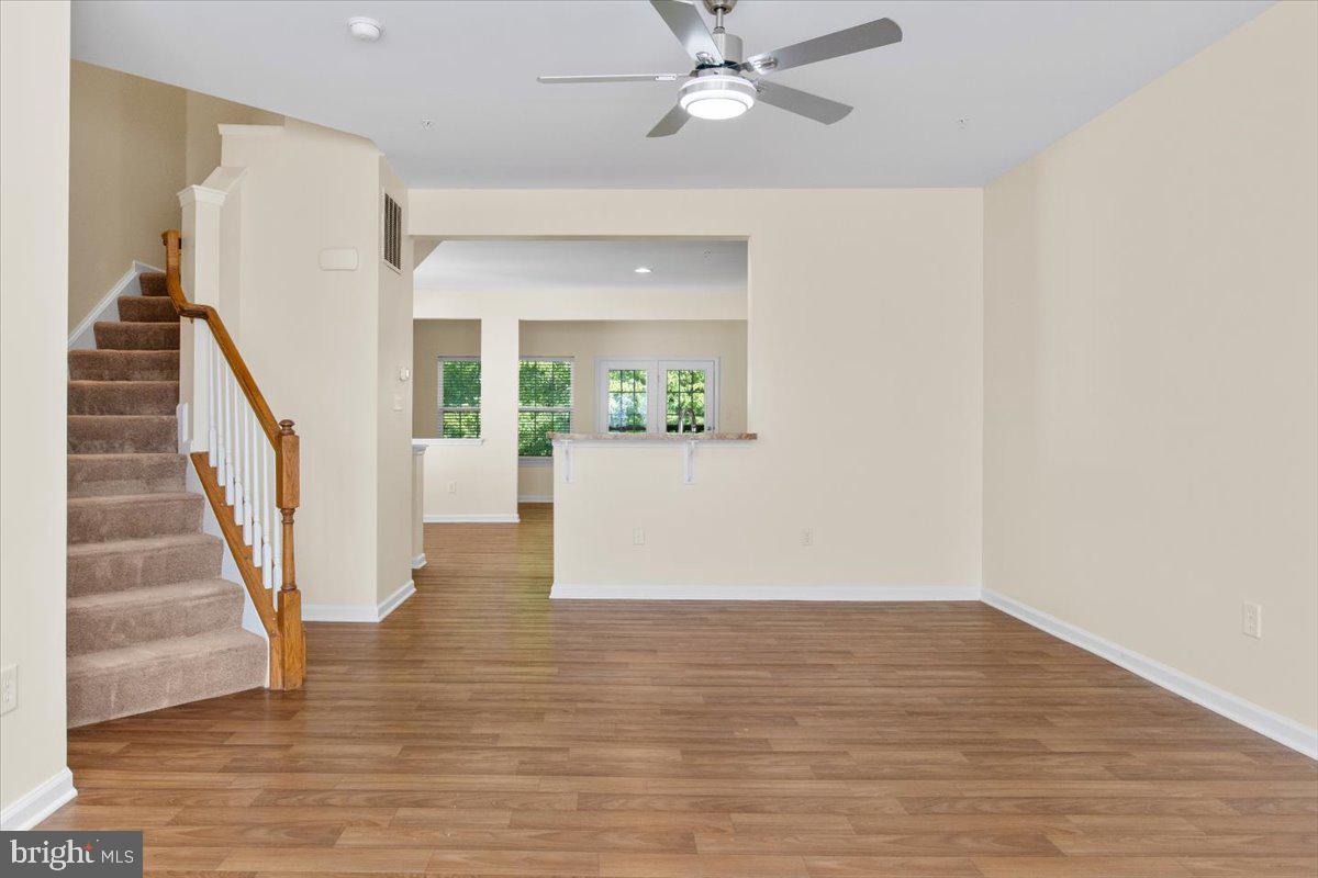8329 Autumn Crest Lane, Unit 6 Chesapeake Beach, MD 20732 - Photo 17 of 30 a view of an entryway with wooden floor