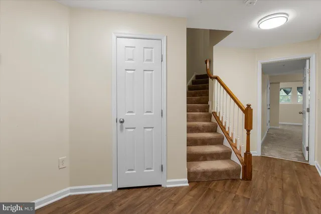 a view of entryway with wooden floor