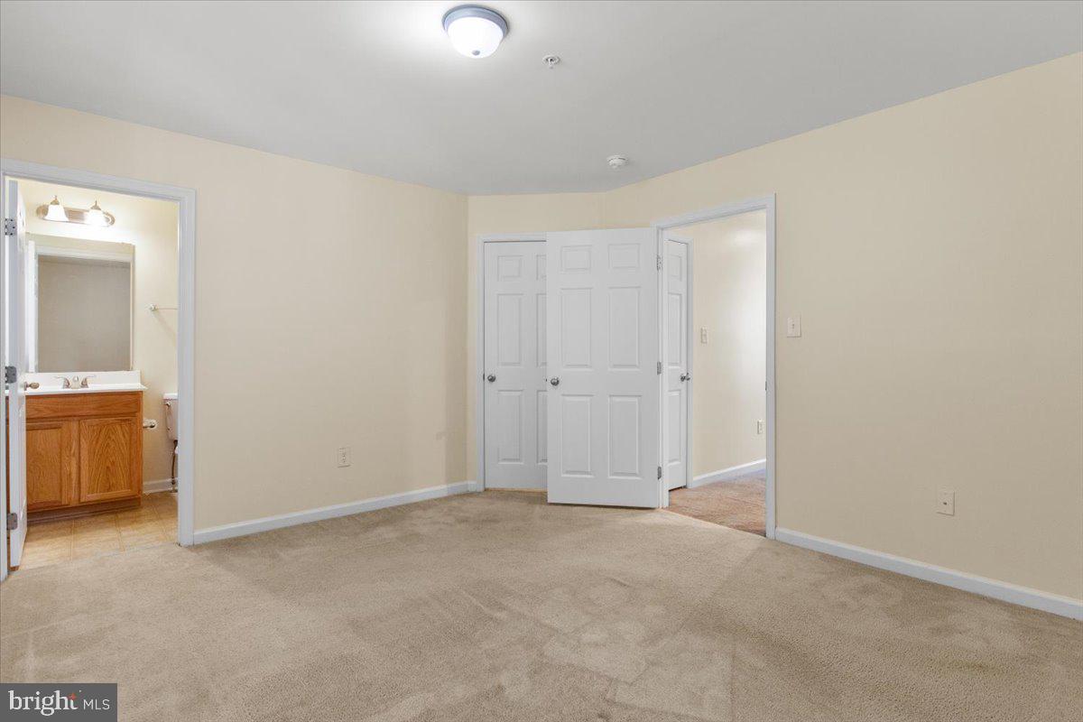 8329 Autumn Crest Lane, Unit 6 Chesapeake Beach, MD 20732 - Photo 21 of 30 a view of an empty room