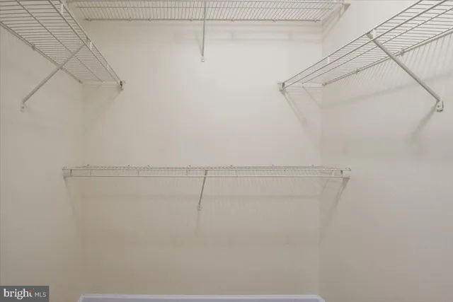 a bathroom with a sink toilet vanity and shower