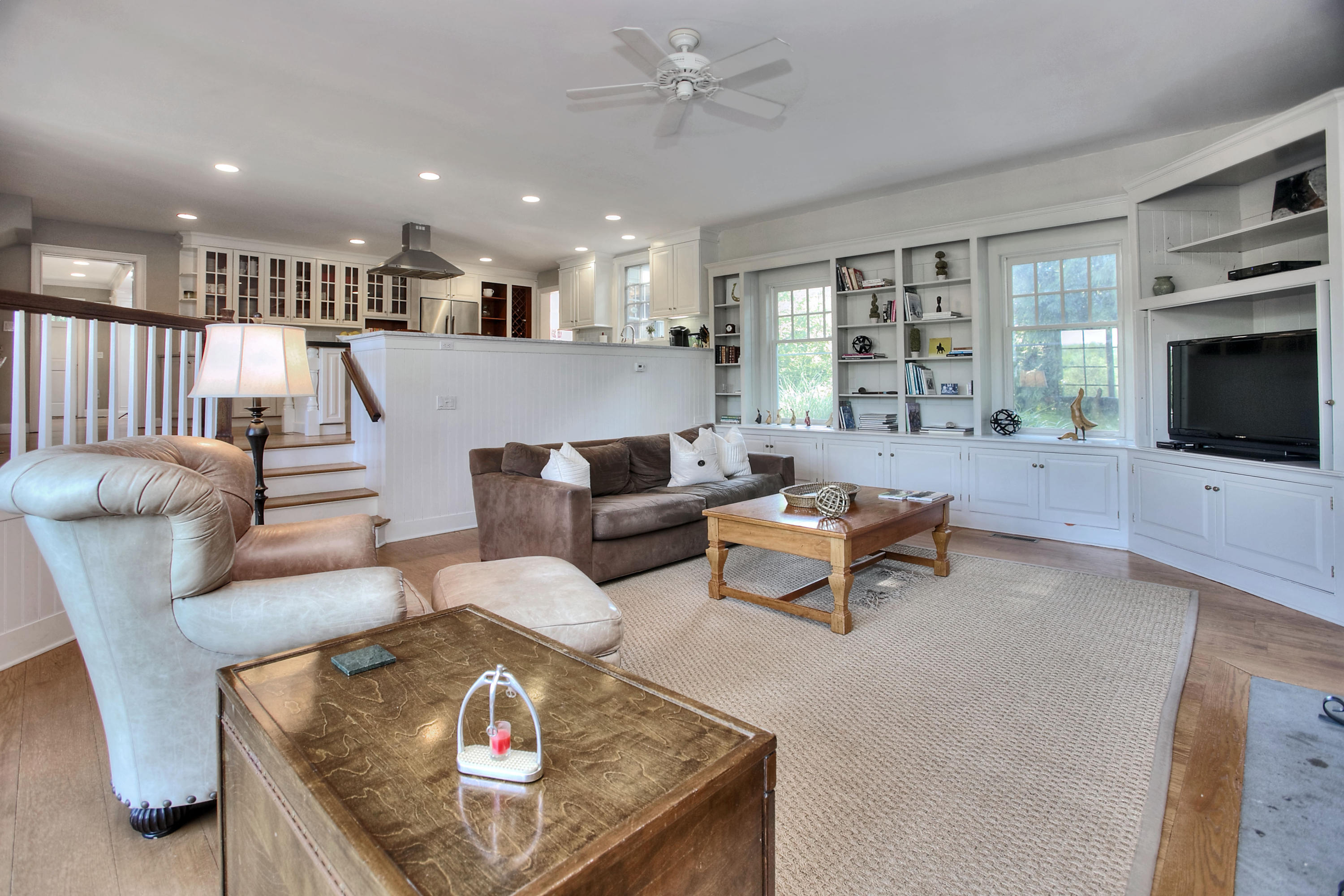 1335 Smith Ridge Road New Canaan, CT 06840 - Photo 17 of 42 a living room with furniture and a flat screen tv