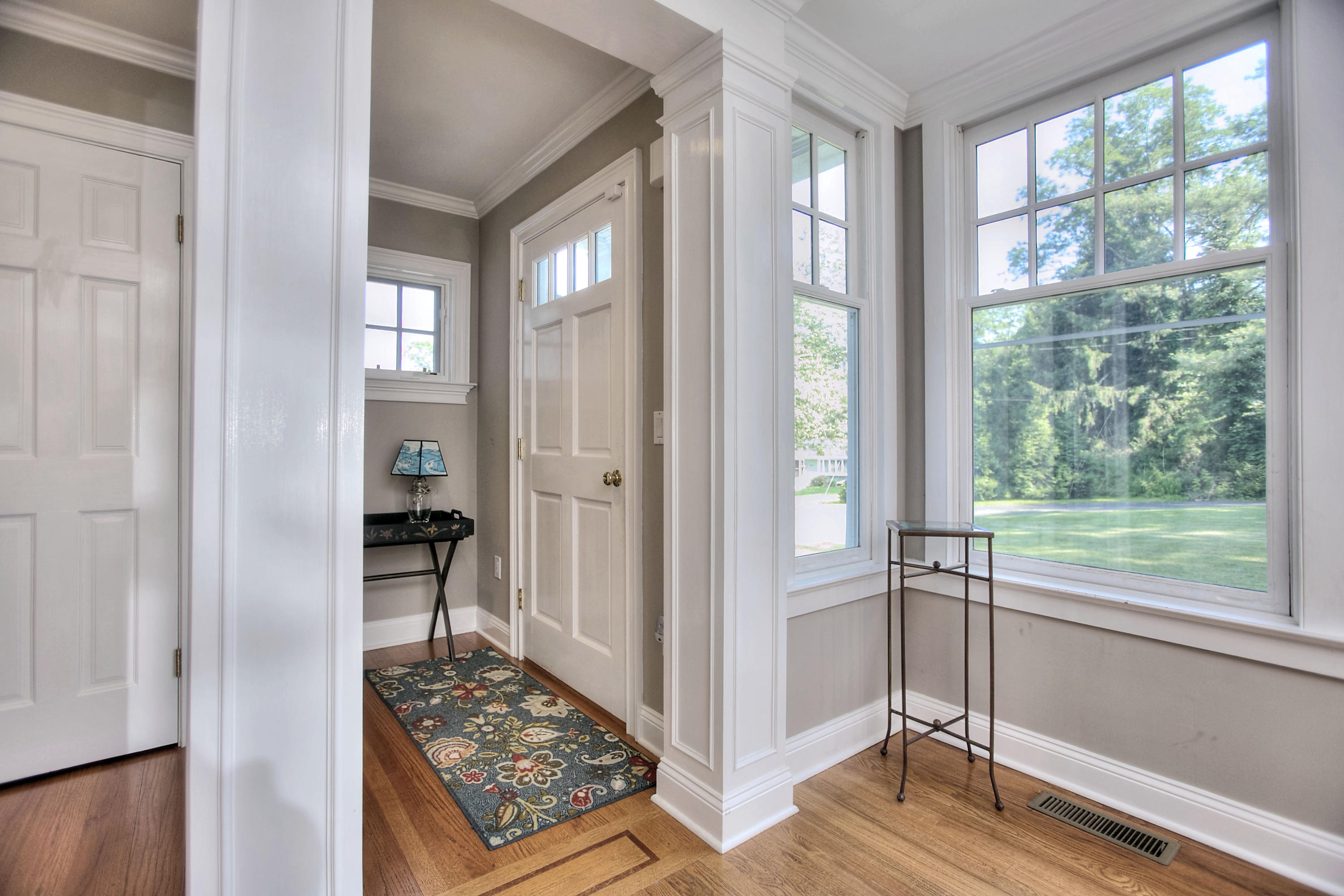 1335 Smith Ridge Road New Canaan, CT 06840 - Photo 2 of 42 a view of a room with wooden floor and windows