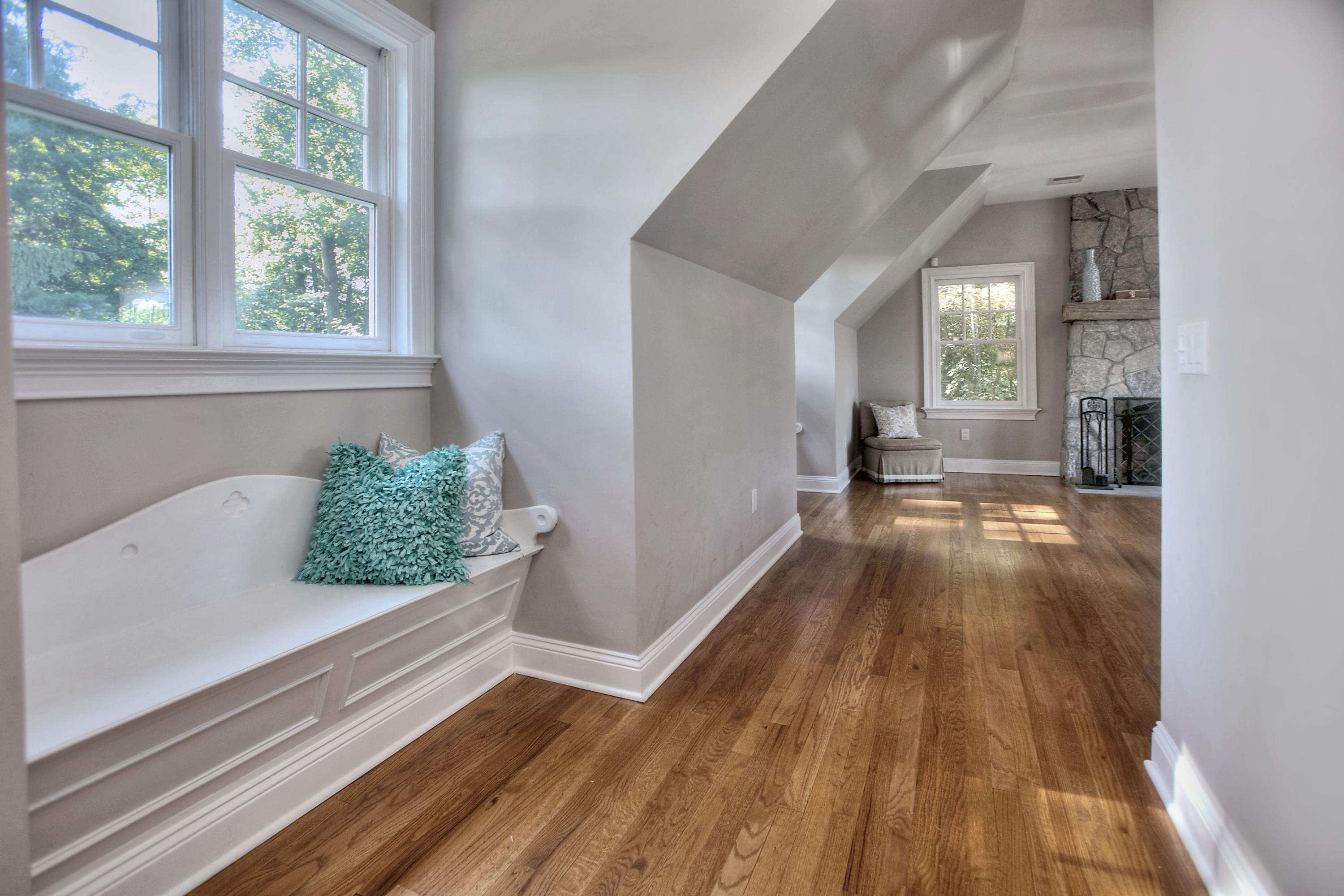 1335 Smith Ridge Road New Canaan, CT 06840 - Photo 24 of 42 a view of a room with wooden floor and windows