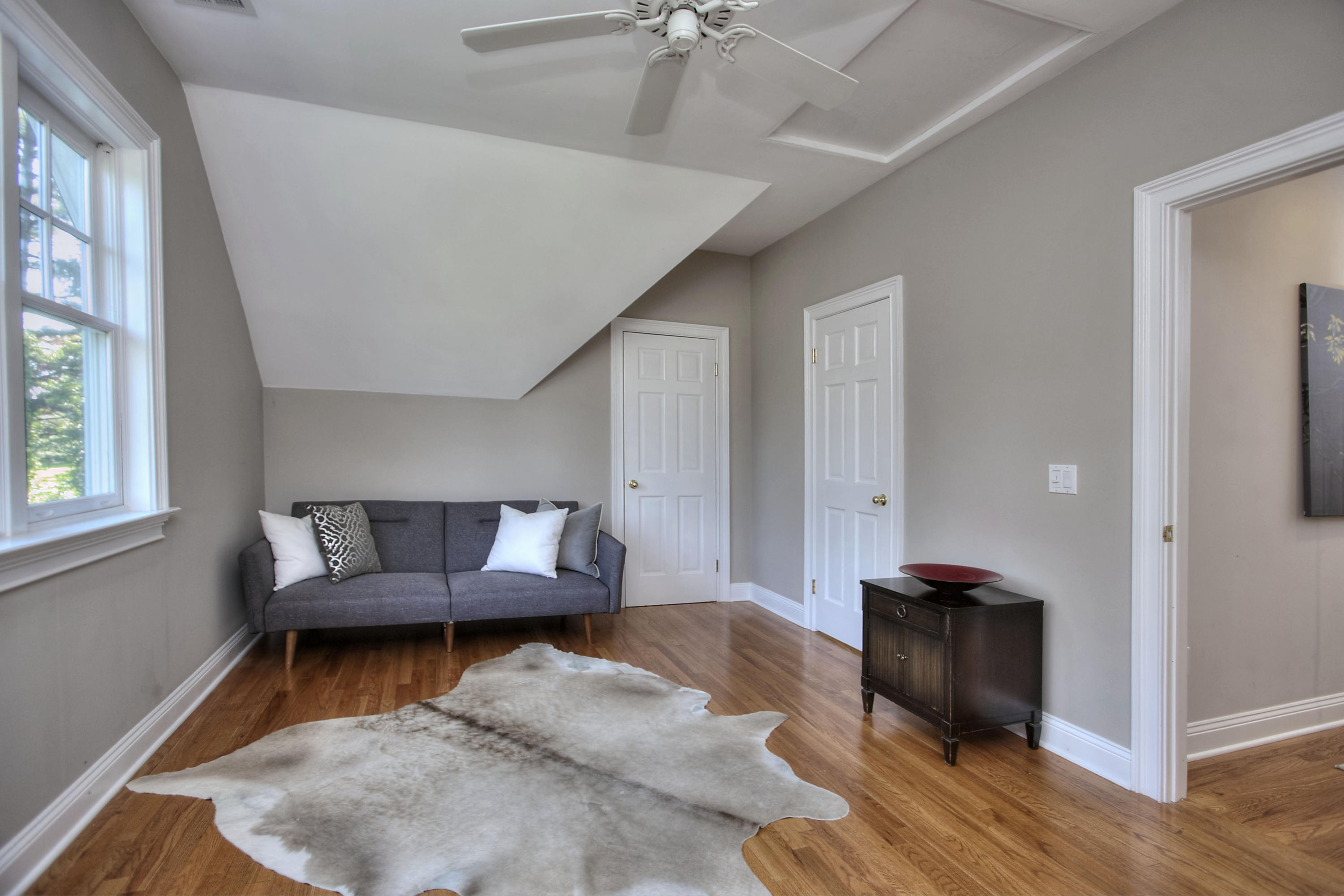 1335 Smith Ridge Road New Canaan, CT 06840 - Photo 31 of 42 a living room with furniture and a fireplace
