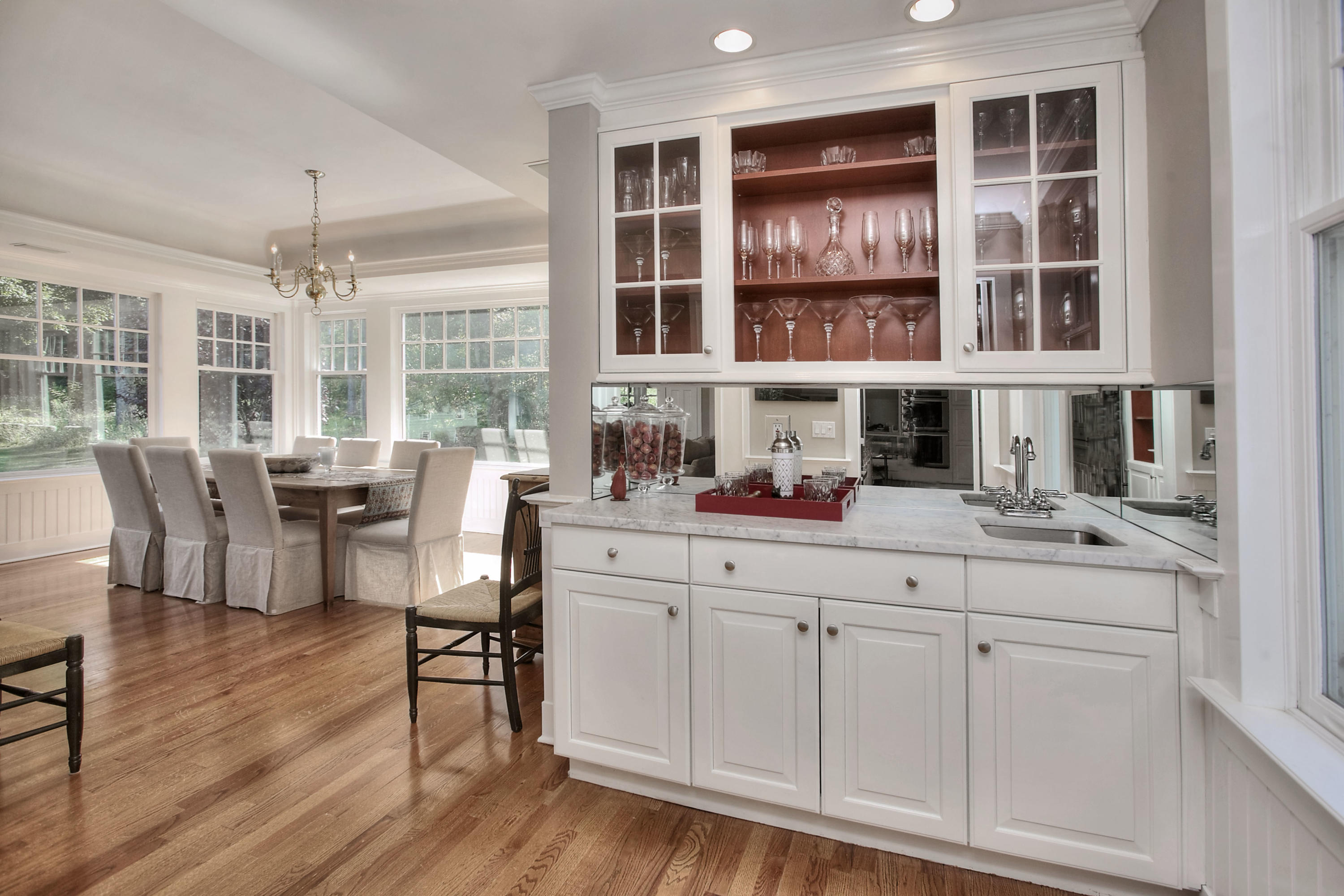 1335 Smith Ridge Road New Canaan, CT 06840 - Photo 7 of 42 a living room with furniture and large windows