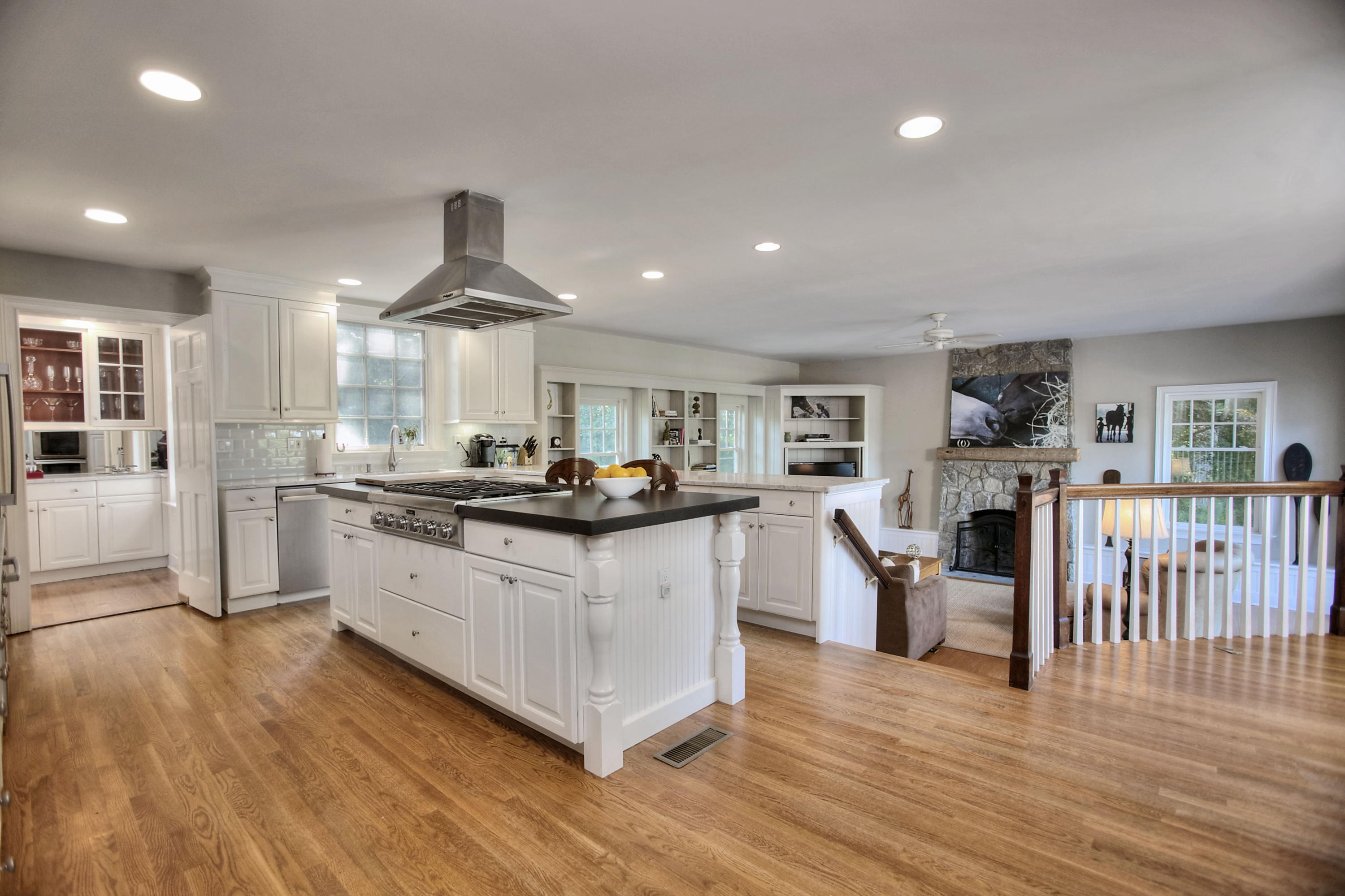 1335 Smith Ridge Road New Canaan, CT 06840 - Photo 9 of 42 a kitchen with stainless steel appliances granite countertop a stove and a wooden floors