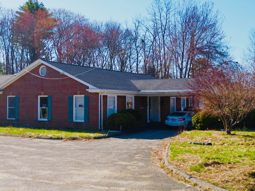 55 Lafayette Road Salisbury, MA 01952 - Photo 5 of 15 a front view of a house with a garden
