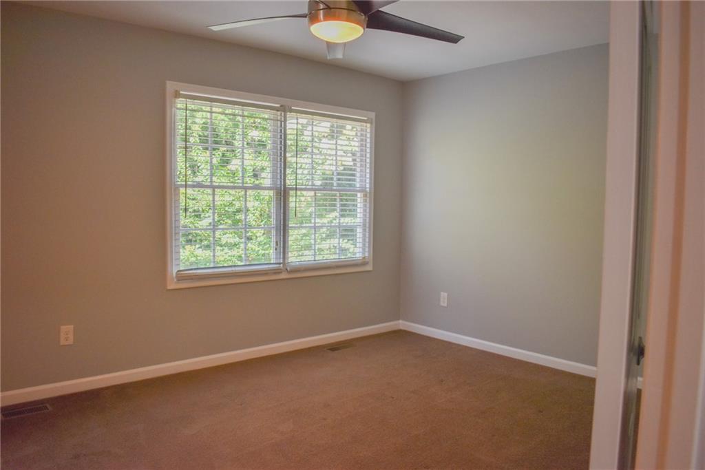 131 Willow Stream Court Roswell, GA 30076 - Photo 12 of 25 an empty room with a window