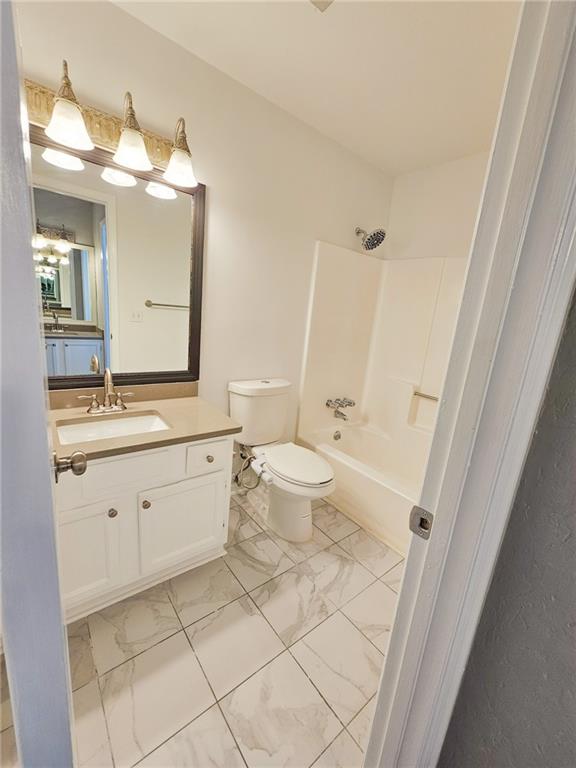 131 Willow Stream Court Roswell, GA 30076 - Photo 15 of 25 a spacious bathroom with a double vanity sink mirror and toilet