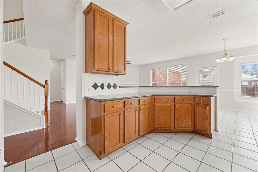 433 Spring Air Drive Allen, TX 75002 - Photo 11 of 27 a spacious bathroom with a granite countertop sink and mirror