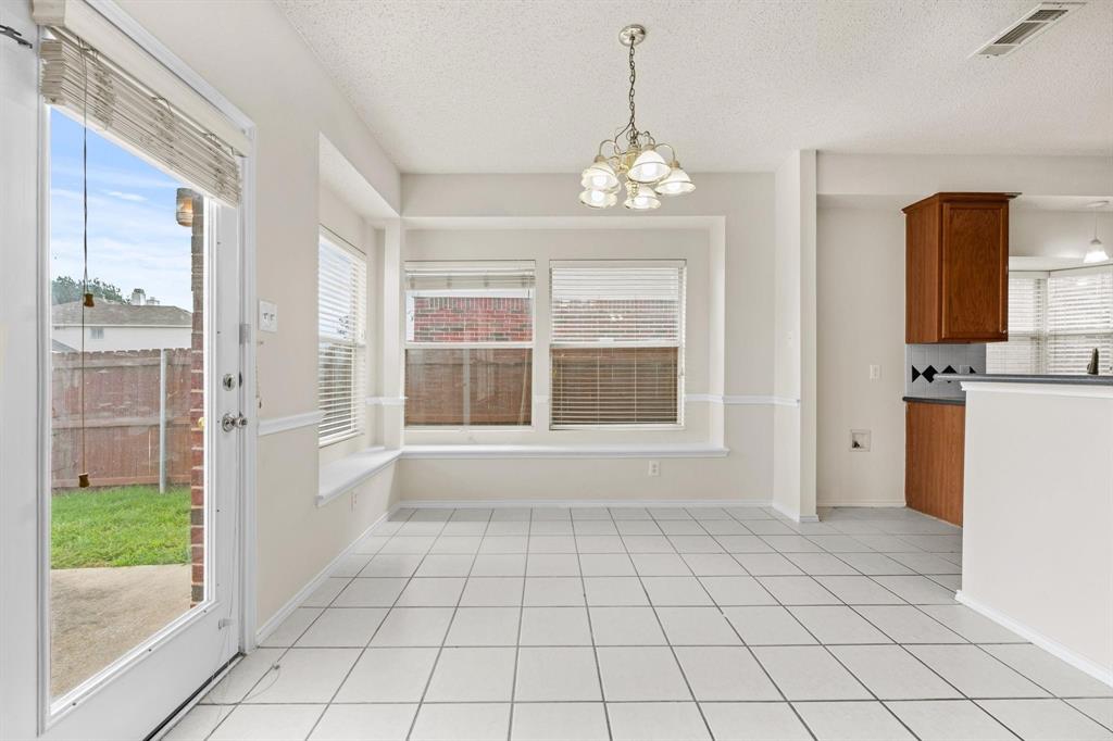 433 Spring Air Drive Allen, TX 75002 - Photo 12 of 27 a view of an empty room with a window