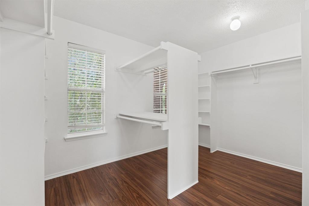 433 Spring Air Drive Allen, TX 75002 - Photo 16 of 27 an empty room with wooden floor and windows