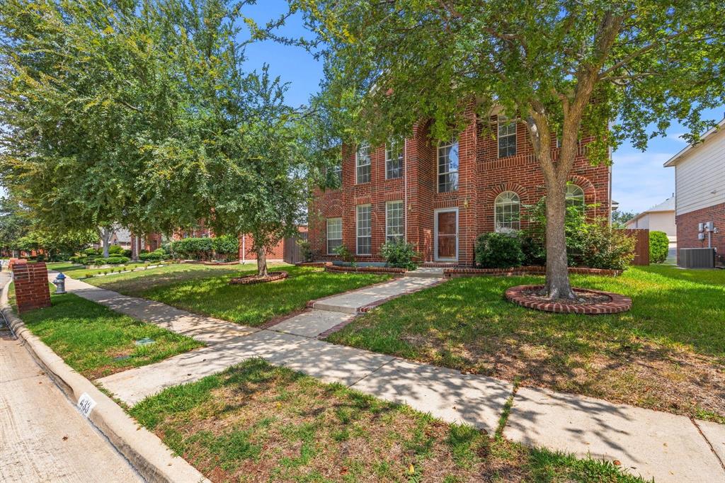 433 Spring Air Drive Allen, TX 75002 - Photo 2 of 27 a view of a house with a yard