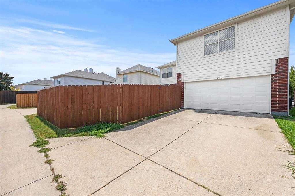 433 Spring Air Drive Allen, TX 75002 - Photo 27 of 27 a view of a garage with a backyard