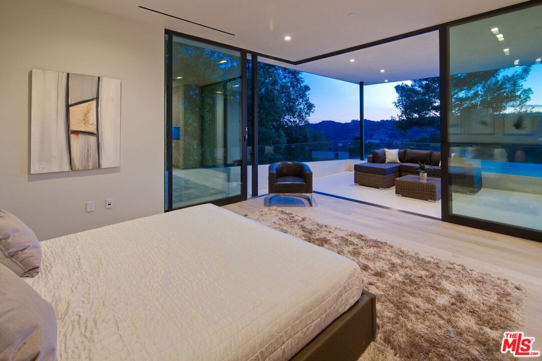 2787 Ellison Drive Beverly Hills, CA 90210 - Photo 12 of 15 a living room with furniture and a large window