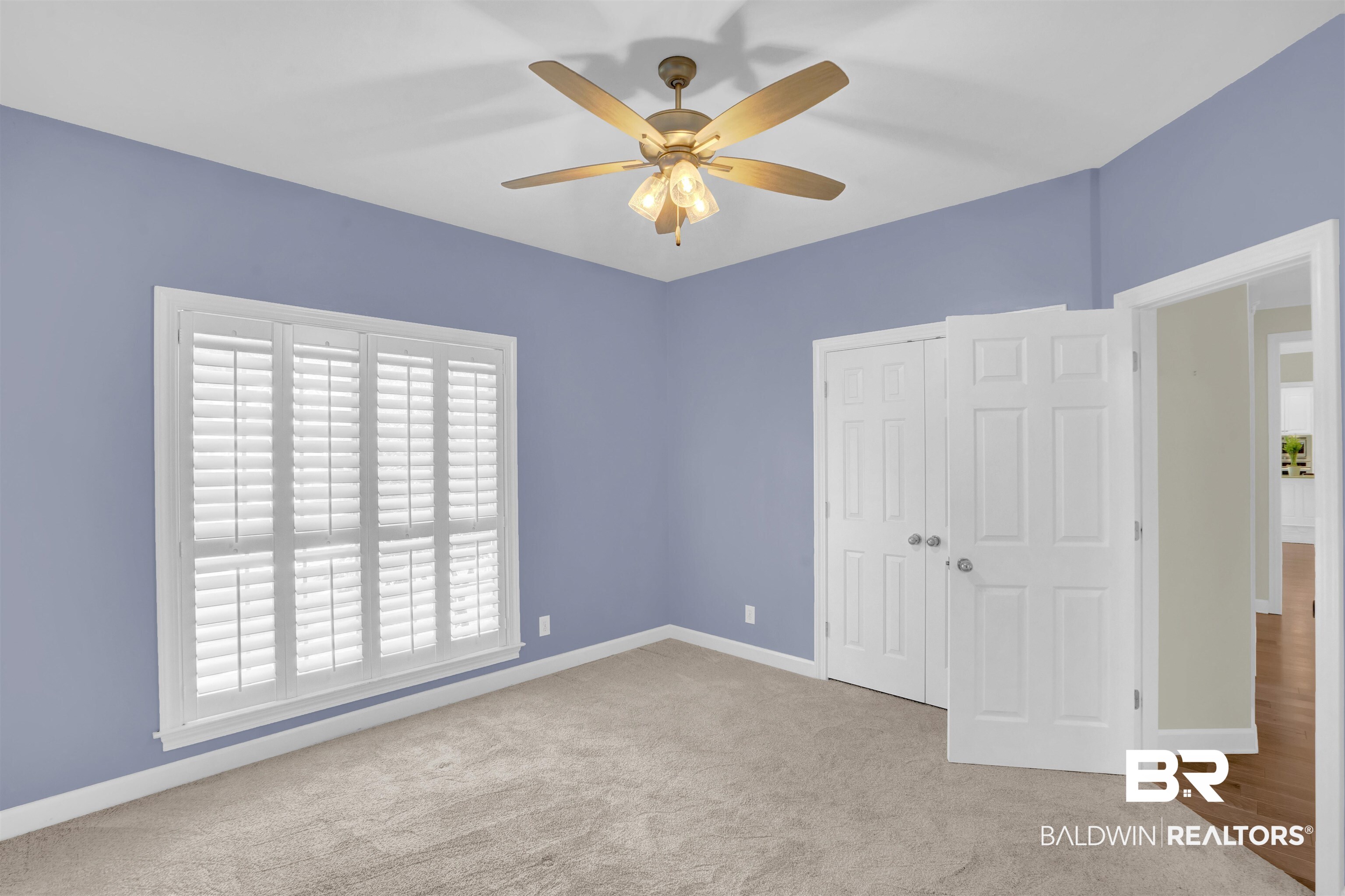 111 Beaver Dam Road Fairhope, AL 36532 - Photo 30 of 51 Unfurnished bedroom featuring light carpet, a closet, and ceiling fan