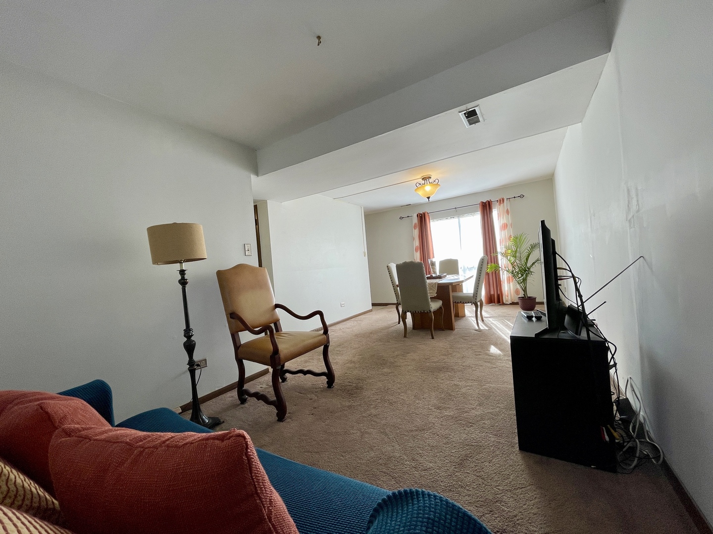 3406 Seine Court Hazel Crest, IL 60429 - Photo 11 of 26 a living room with furniture and a flat screen tv