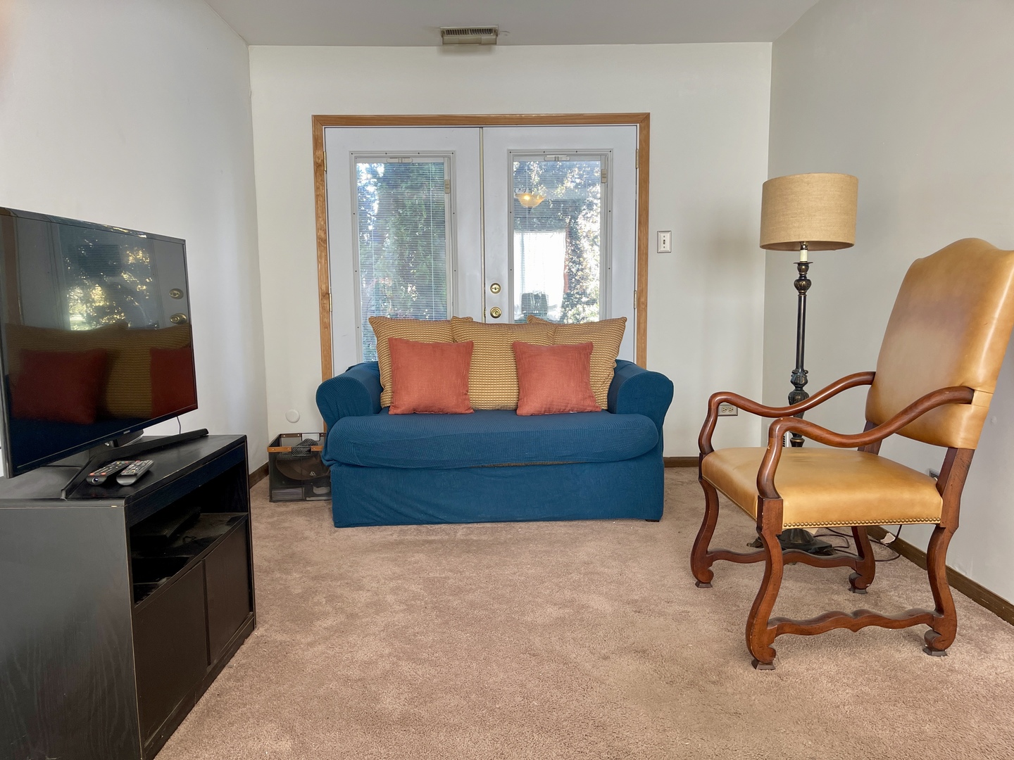 3406 Seine Court Hazel Crest, IL 60429 - Photo 12 of 26 a living room with furniture a flat screen tv and a window