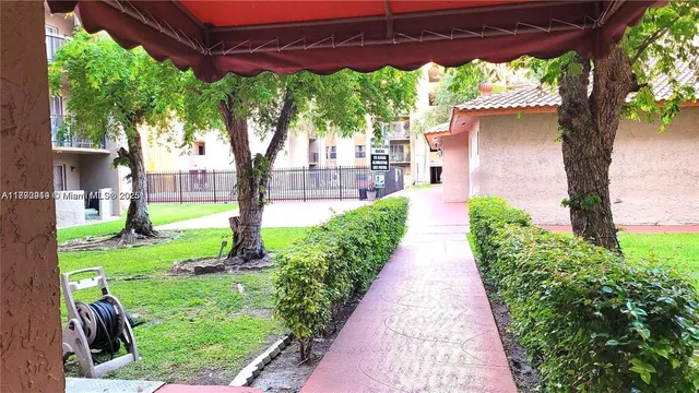 a view of a garden with pathway