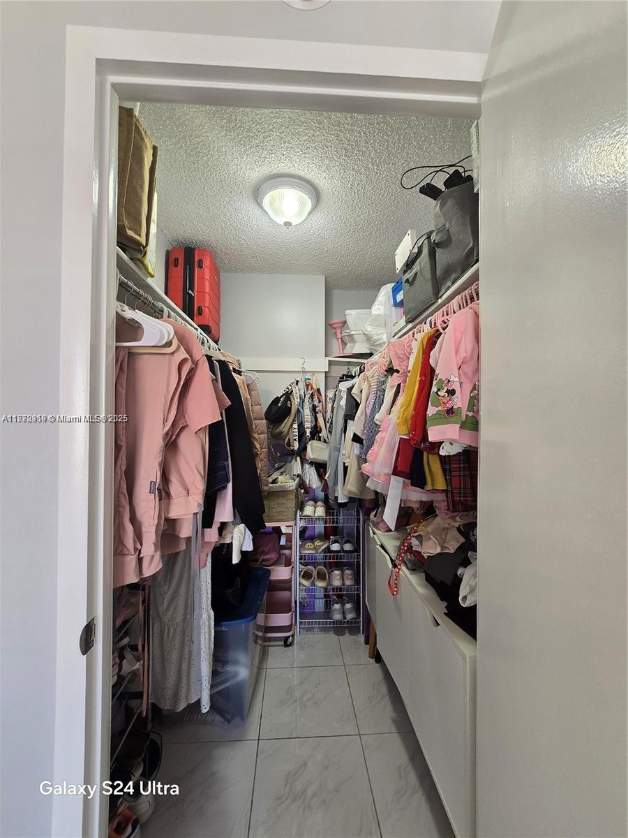 5201 Northwest 7th Street, Unit 609W Miami, FL 33126 - Photo 10 of 11 a view of a storage & utility room